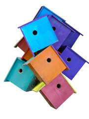 Colorful weathered jumble of birdhouses. Isolated.