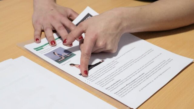 massage chiropractic papers finger close