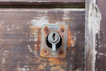 old lock on wooden door