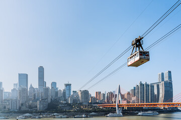 Scenery of high-rise buildings and Yangtze River cableway in Chongqing, China
