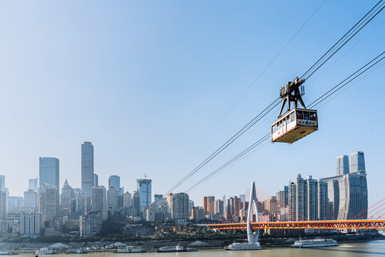 Scenery of high-rise buildings and Yangtze River cableway in Chongqing, China
