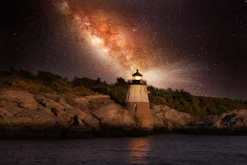 Tuinposter Beautiful stars of the Milky Way Galaxy over Castle Hill Lighthouse in Rhode Island © littleny
