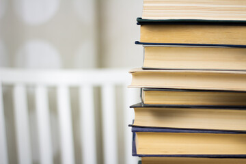 a stack of books on a light background