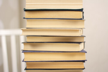 a stack of books on a light background