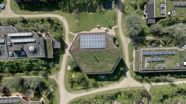 High top down lift up of beautiful green earthship village