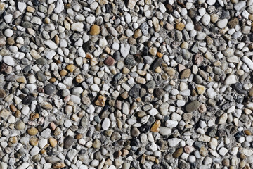 Gravel texture. Small rocks grain pattern for graphic design. Little stones background. Gray noise backdrop.