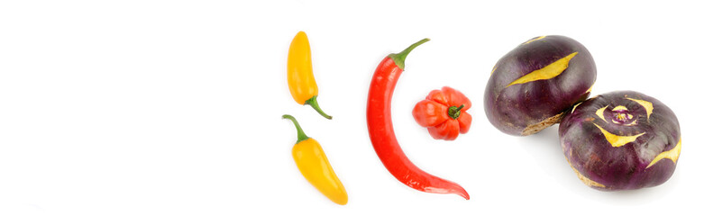 Chili peppers , kohlrabi and fresh tomatoes isolated on white. Wide photo. Free space for text.