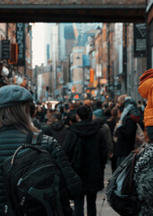 crowd of people walking in the city