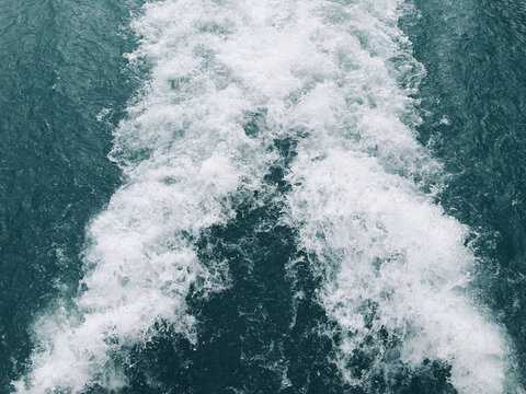a wave of water, wake