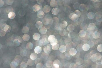 abstract silver bokeh background from glitter