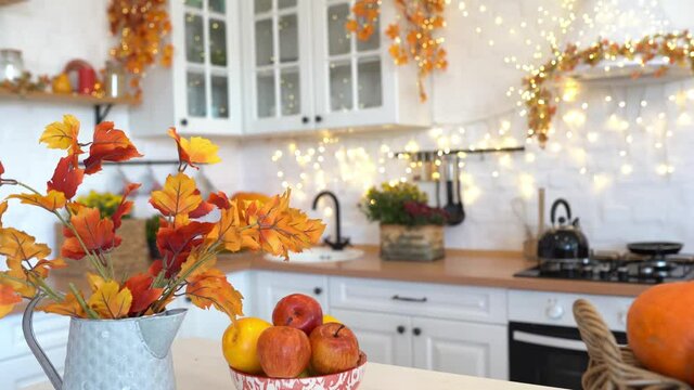 Thanksgiving with fruits and vegetables on table in autumn kitchen