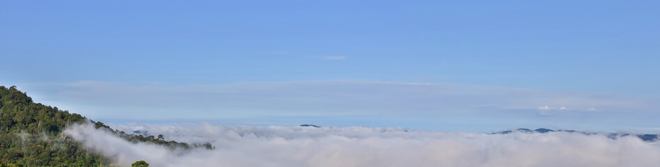 Morning mist and mountain. Morning fog in the mountain. Panorama View nature mountain sky and fog.