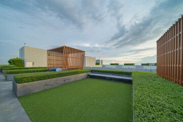 Sky garden on private rooftop of condominium or hotel, high rise architecture building with tree,...