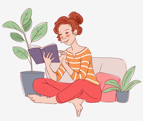 Obraz na płótnie Canvas Cute girl reading a book 