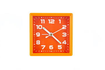 Orange square alarm clock isolated on white background. Clock, time, do not oversleep at school or work. Punctuality