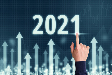 Concept for a successful year 2021 in business with abstract upward arrows.