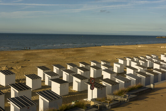 sunset on the bathhouses on the beach of Ostend, Belgium