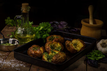 Baked potatoes with cheese and sauce