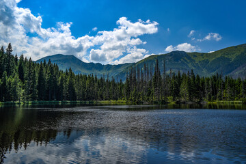 Fototapeta na wymiar Smreczynski pond in the Western Tatras in Poland. Mountain landscape.