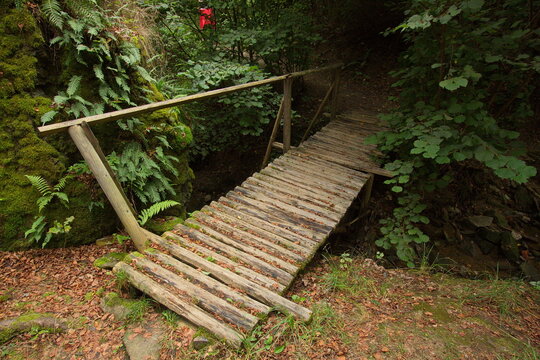 Old wooden bridge on the hiking track in the valley of river Mže in Stř&iacute;bro,Plzeň Region,Czech Republic,Europe
