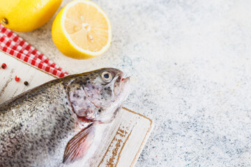 Raw rainbow trout light background