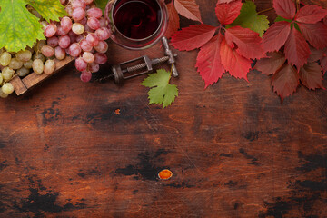 Red wine and grapes