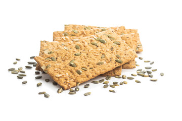 The  crispy bread with pumpkin seeds. Knackebrot on white background.