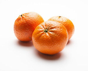 Group of tangerines on white background, supermarket presentation, above shot