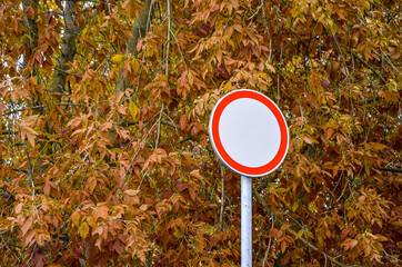 Round prohibiting road sign 