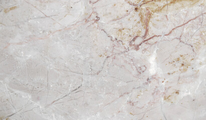 Naklejka premium natural marble with beige and brown veins on a white background