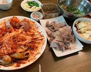 This is a Korean food that is kimchi and boiled pork.