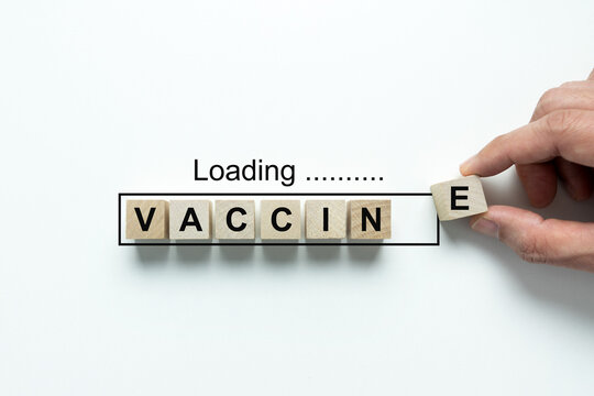 Hand Loading Letter E Of Vaccine For Covid 19 Vaccine Readiness Concept