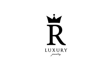Fototapeta premium R alphabet letter logo icon in black and white color. Creative design with king crown for luxury or fashion business and company