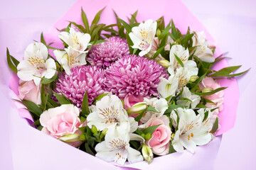 Beautiful flowers on green background roses and asters