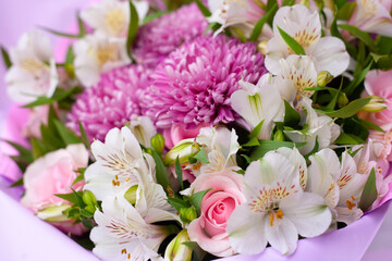 Beautiful flowers on green background roses and asters