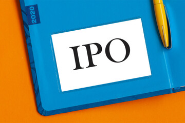 IPO or Initial Public Offering, word on paper.