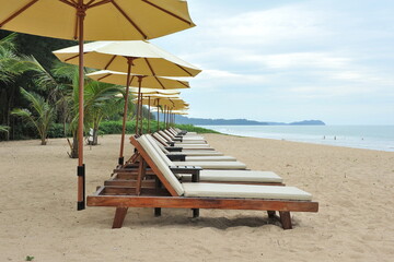 beach chairs and umbrella