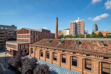 A view of area of Poblenou, old industrial district converted into new modern neighbourhood with...