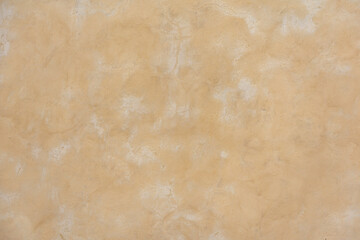 Fondo con textura de una vieja pared beige
