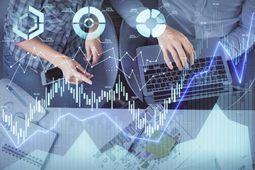 Multi exposure of man and woman working together and forex graph hologram drawing. Financial analysis concept. Computer background. Top View.