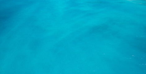 Fototapeta na wymiar aerial shot of strange colors of water in the ocean 