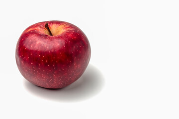 red Apple close-up on a white background