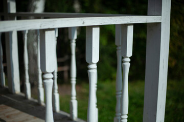 Balusters in the decoration of the veranda railings. 