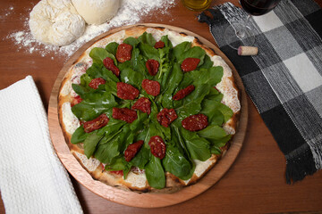 pizza  rucula and dried tomato