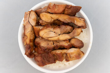 Overhead view of Chinese food ordered from restaurant for some good bowl of rice and teriaki chicken.