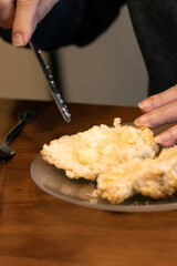 Elderly woman preparing baked and enjoying goods