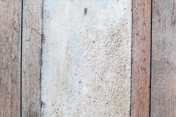 Concrete with a texture of wooden boards texture distressed grunge background, scratched white paint on planks of wood wall.