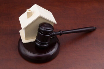 Real estate business and auction concept, judge gavel and house
