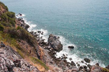 waves crashing on rocks