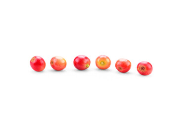 Red coffee beans, ripe and unripe berry fruit isolated on white background.